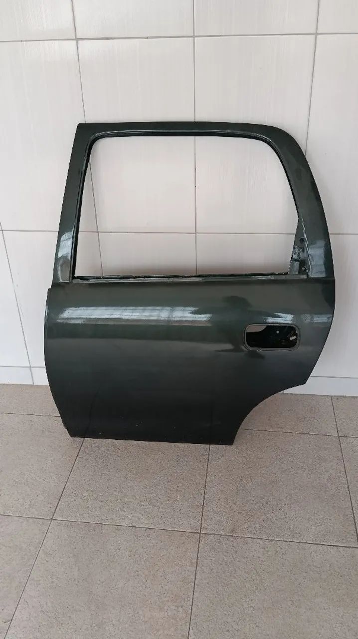 Porta traseira lado esquerdo e paralama lado esquerdo. - Foto 4