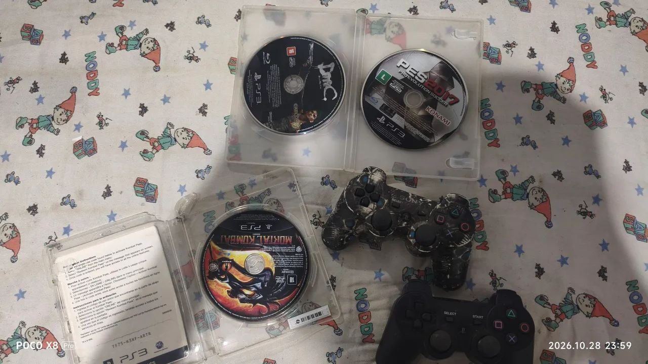 3 jogos de ps3 e dois controles 