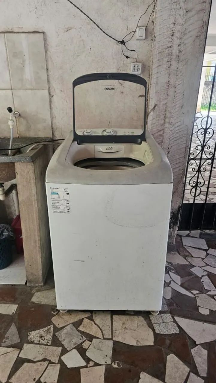 Máquina de lavar roupa com defeito