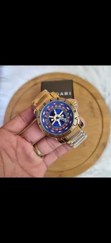 Relógio bvgari Cassiano fundo azul 