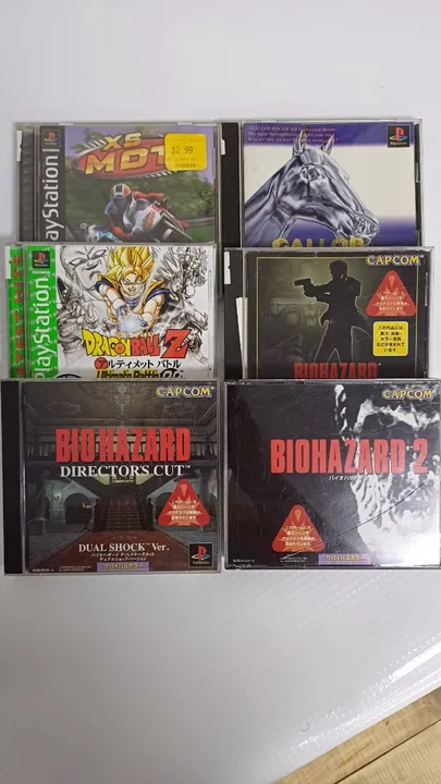 Lote de jogos originais de ps1 com Biohazard e dragonball z