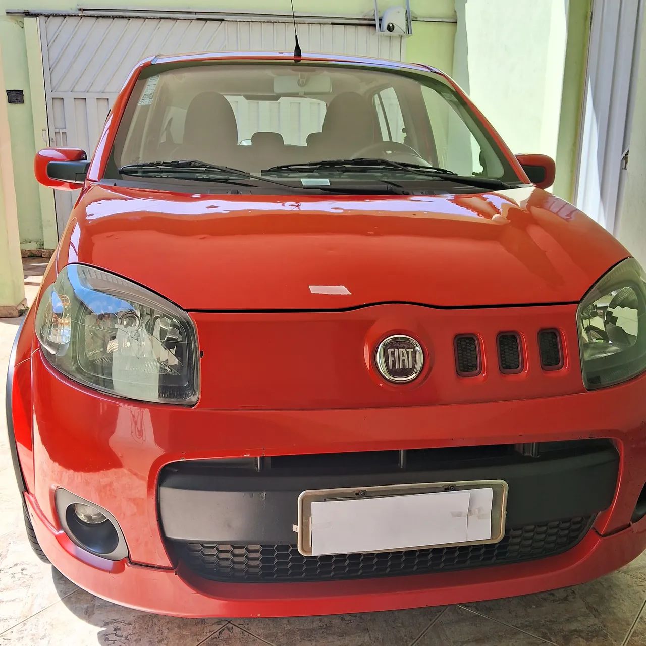 Fiat Uno UNO SPORTING 1.4 EVO Fire Flex 8V 4p 2012