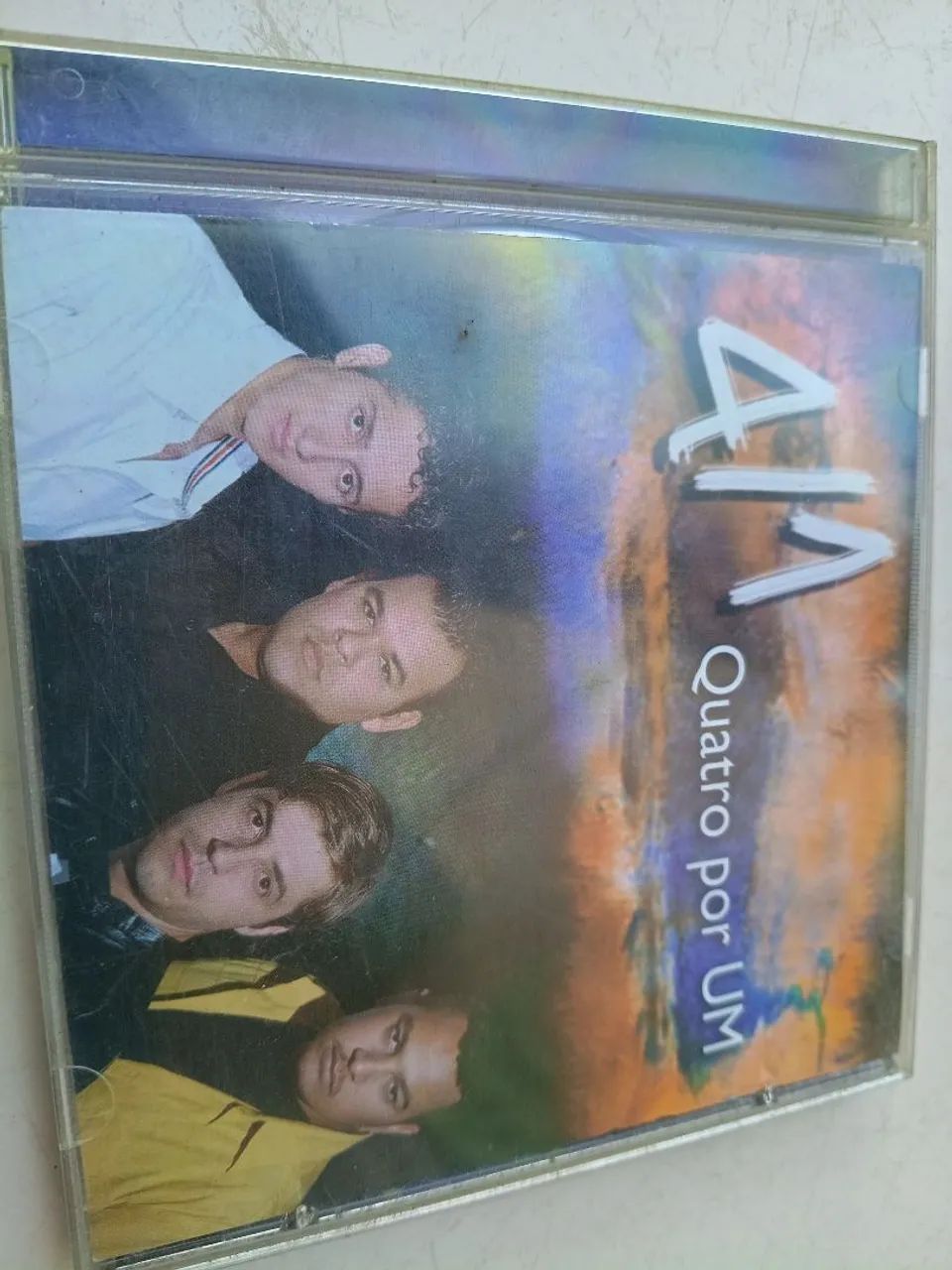Cd quatro por um 
