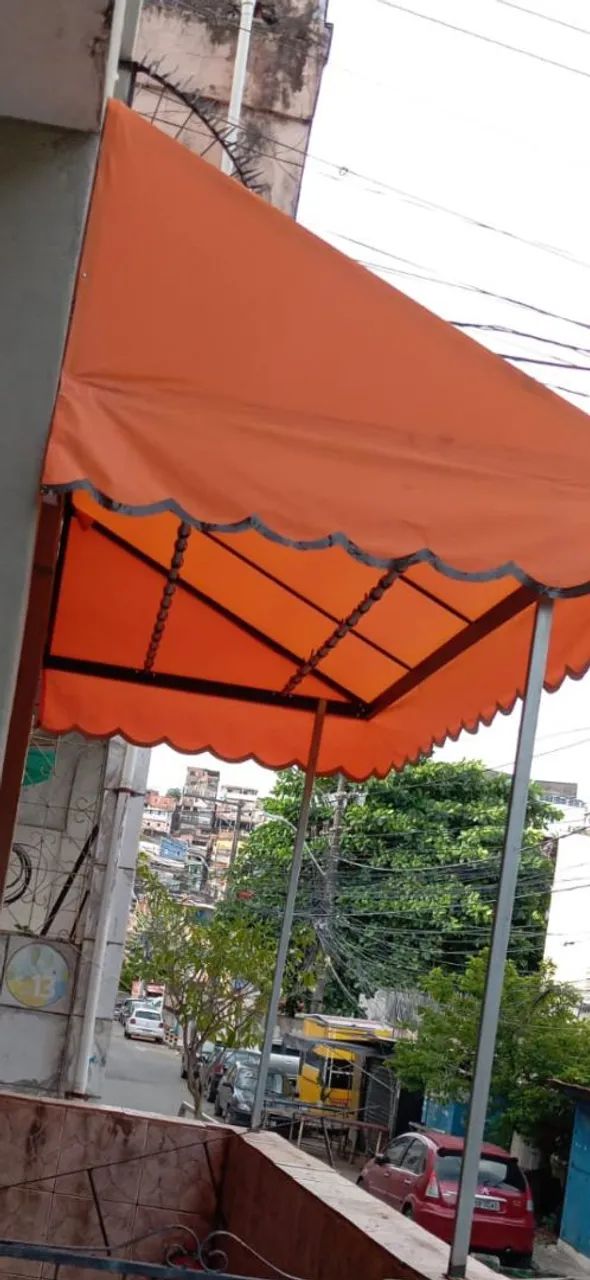 Um toldo  muito bonito.pra colocar na porta.Do seu comércio. 