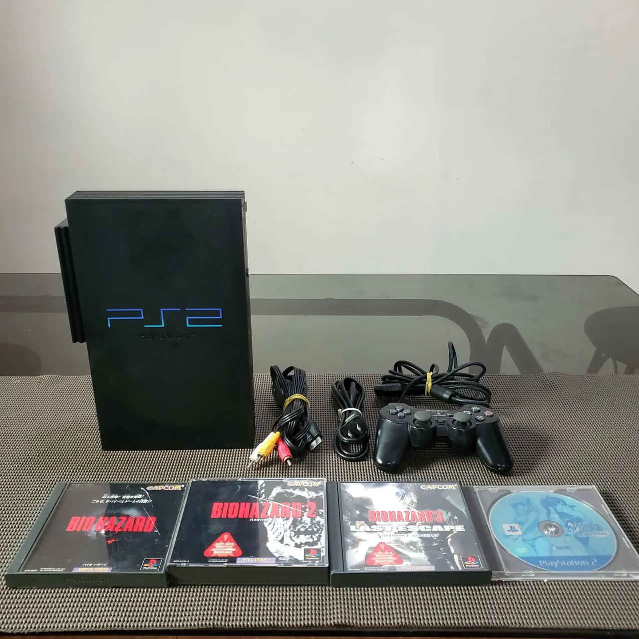 CONSOLE PLAYSTATION 2 SLIM PINK JAPONÊS (SCPH-77000) NA CAIXA