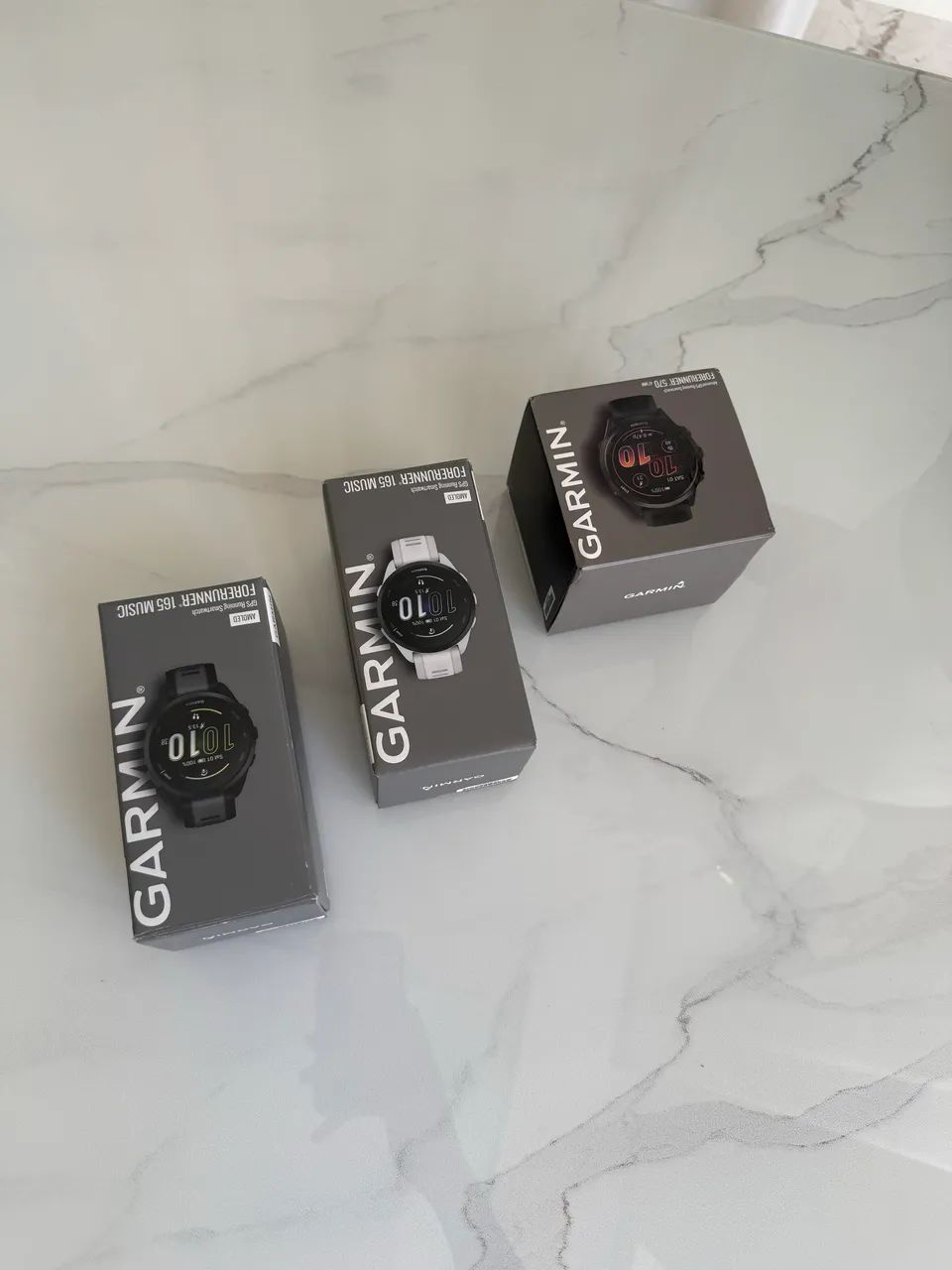 Garmin forerunner 165 e Garmin forerunner 570