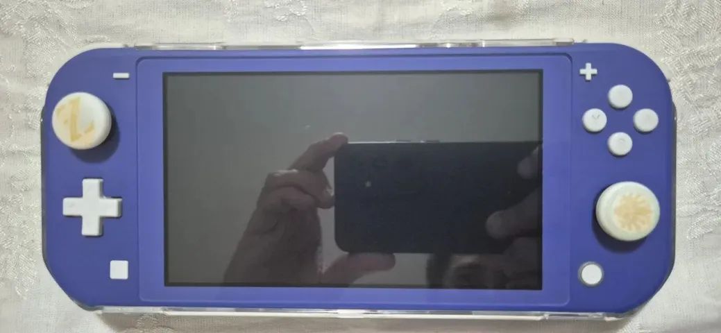 Nintendo Switch Lite + acessórios e microSD 64gb - Consoles de