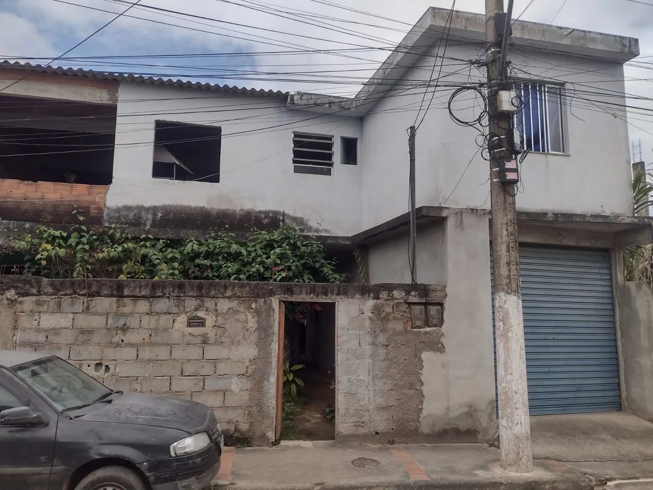 Vendo casa c/ 1 kitnet e 1 loja 