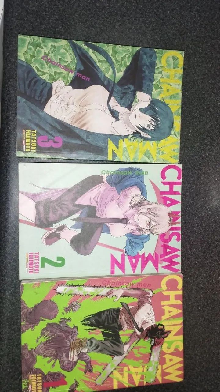 Três volumes juntos de chainws man 