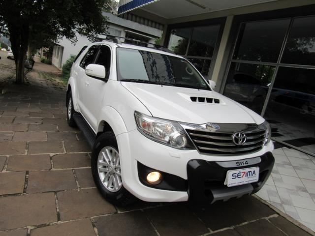 Hilux SW4 SRV 4x4 Aut / 7 Lug - 2015 - Foto 6