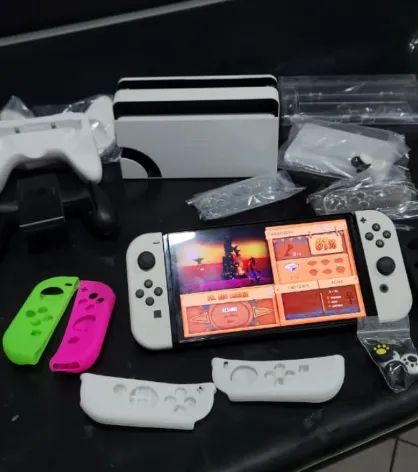 Nintendo Switch Oled Desbloqueado na caixa com acessórios extras - Foto 2