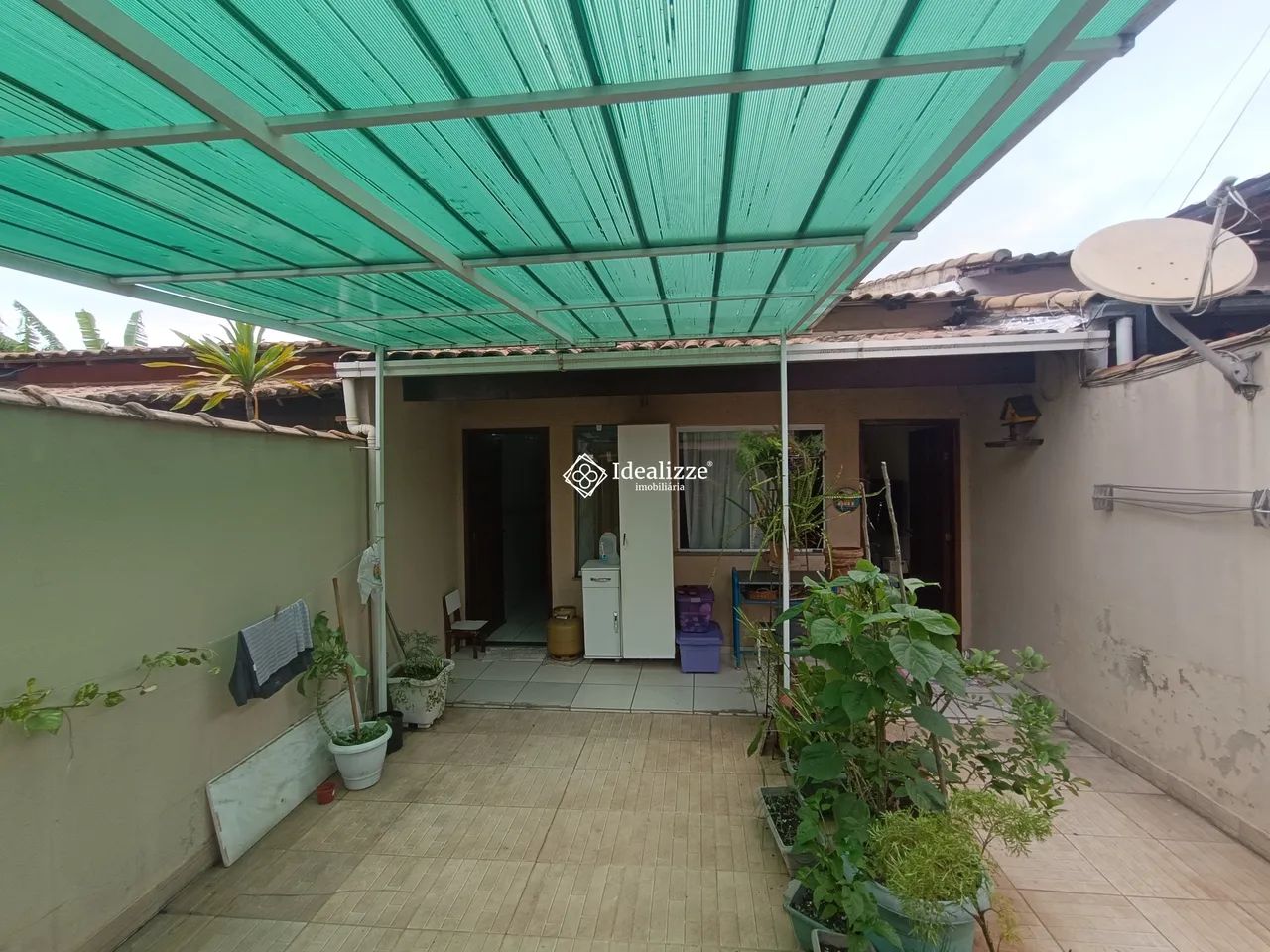 Casa com Dois quartos e varanda com área de churrasco no bairro Belmonte