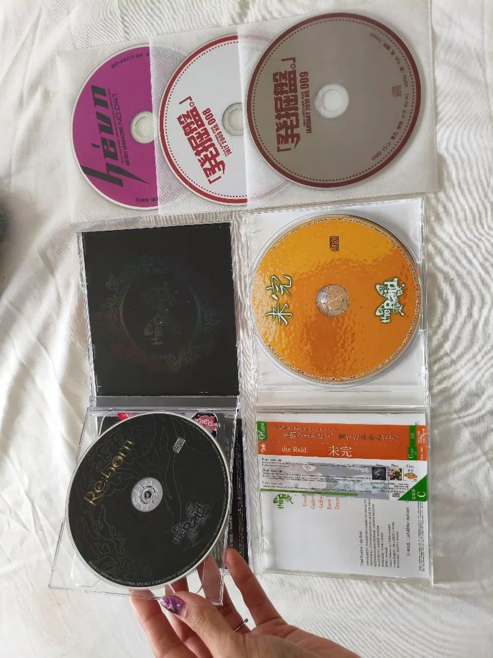 LOTE CDS VISUAL KEI EDIÇÕES LIMITADAS THE RAID E REVISTA HEVN