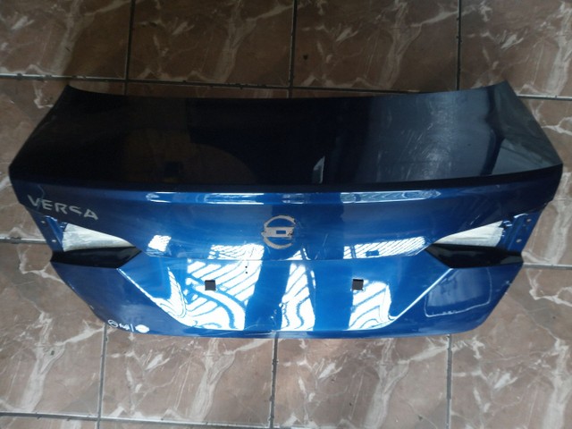 Tampa traseira Nissan Versa 2022  - Foto 4