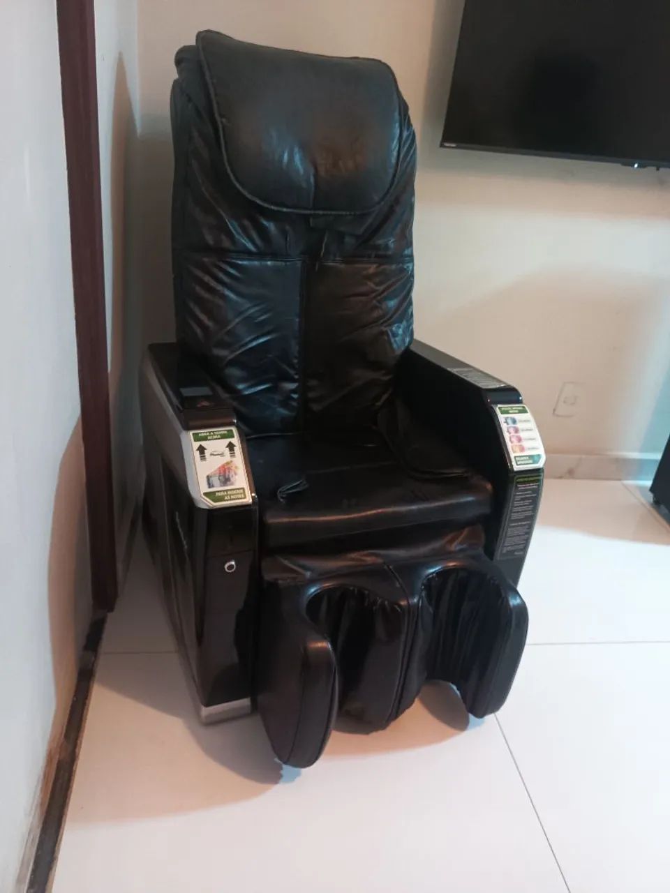 Poltrona de massagem elétrica.