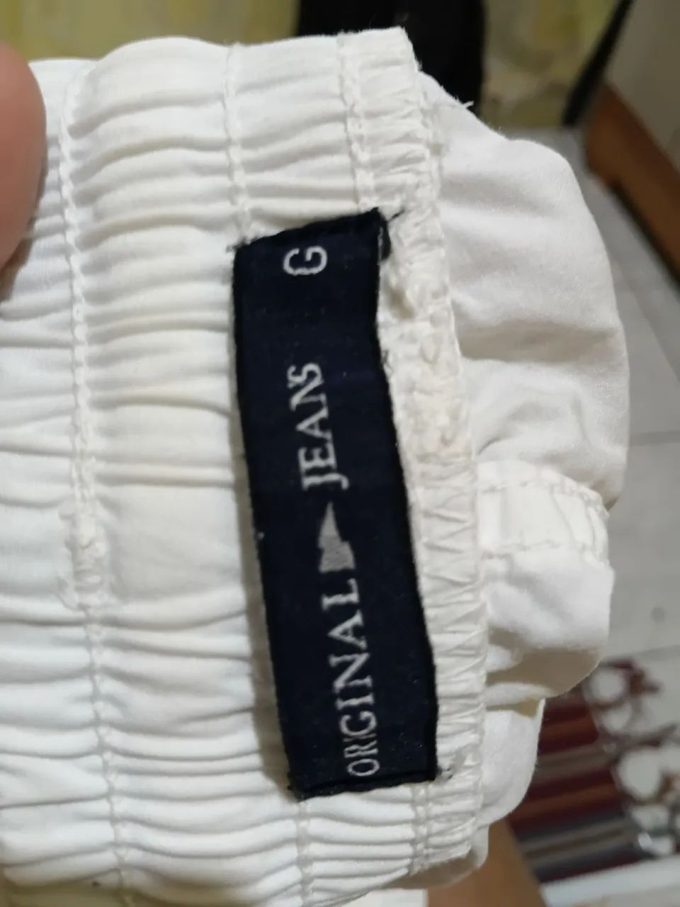 Uma camisa e uma bermuda  - Foto 4
