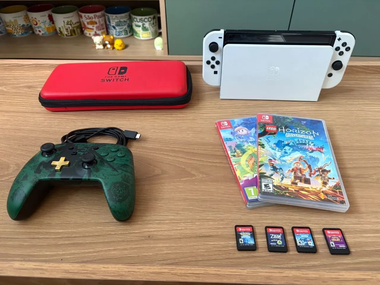 Nintendo Switch OLED com 5 jogos e controle - Foto 2