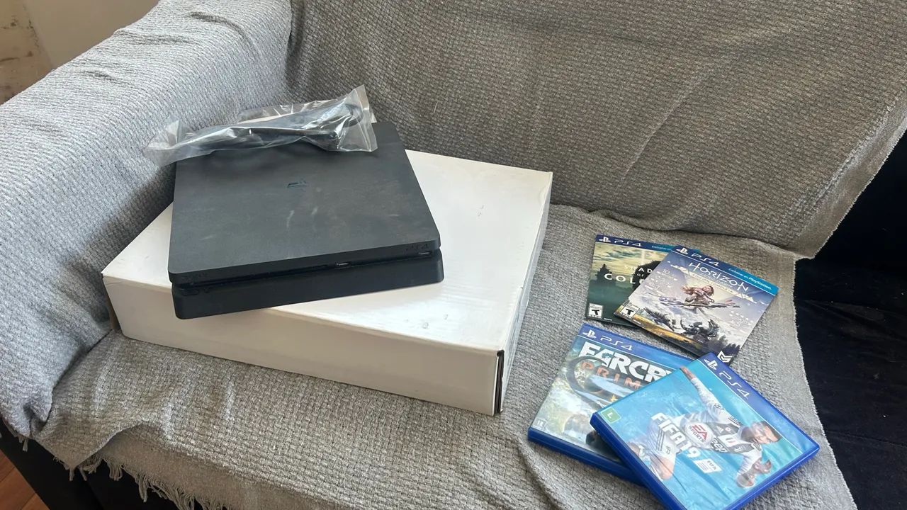 PS4 Slim 1TB + 4 jogos  - Foto 3