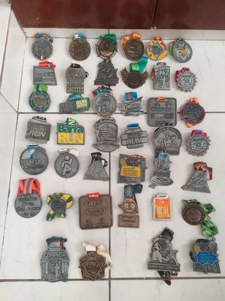 COLEÇÃO DE MEDALHAS DE CORRIDAS DE VÁRIOS EVENTOS OCORRIDOS NO RIO DE JANEIRO SÃO 71 TOTAl