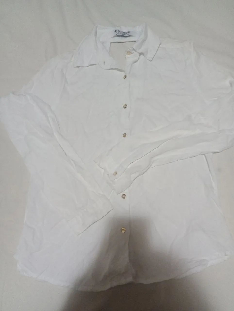 Camisa lança perfume 