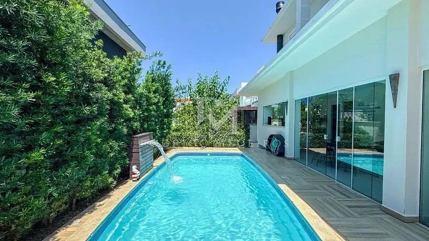 Casa em condomínio com 4 suítes no Rio Tavares, Florianópolis - Foto 5