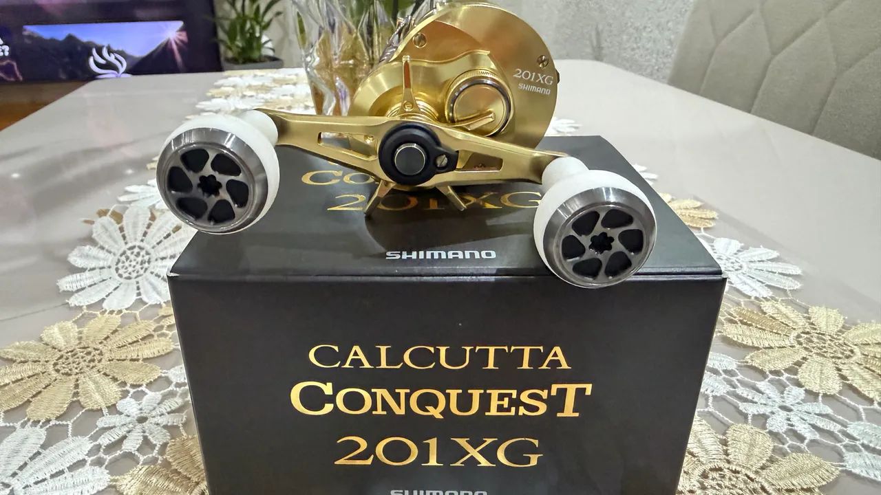 Carretilha Calcutta conquest 201 XG semi nova - Hobbies e coleções
