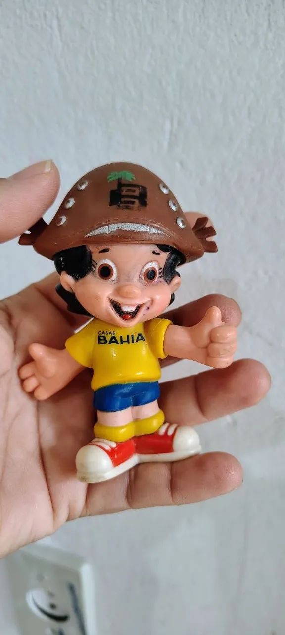 Boneco antigo casas Bahia relíquia 
