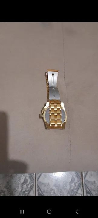 Relógio de pulso masculino dourado - Foto 4