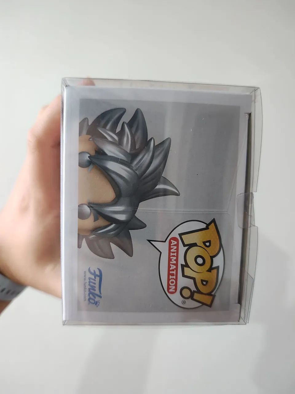Funko Pop! Goku Ultra Instinct - Hot Topic Exclusive Glow in The Dark + Protetor Incluso  - Foto 5