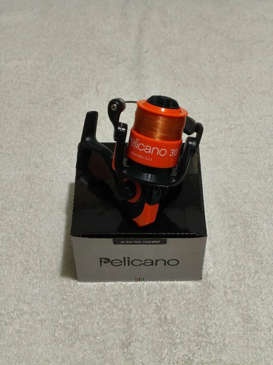Molinete pelicano 3000 novo - Foto 2