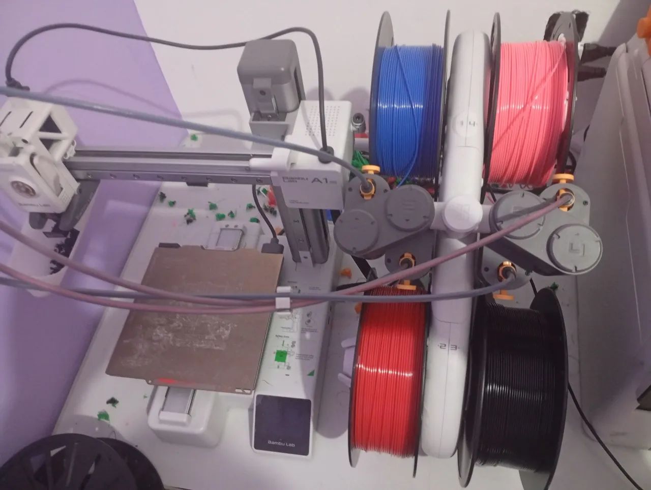 Impressora 3D Bambu lab A1 mini + AMS + 10 rolos de filamentos com 2 fechados