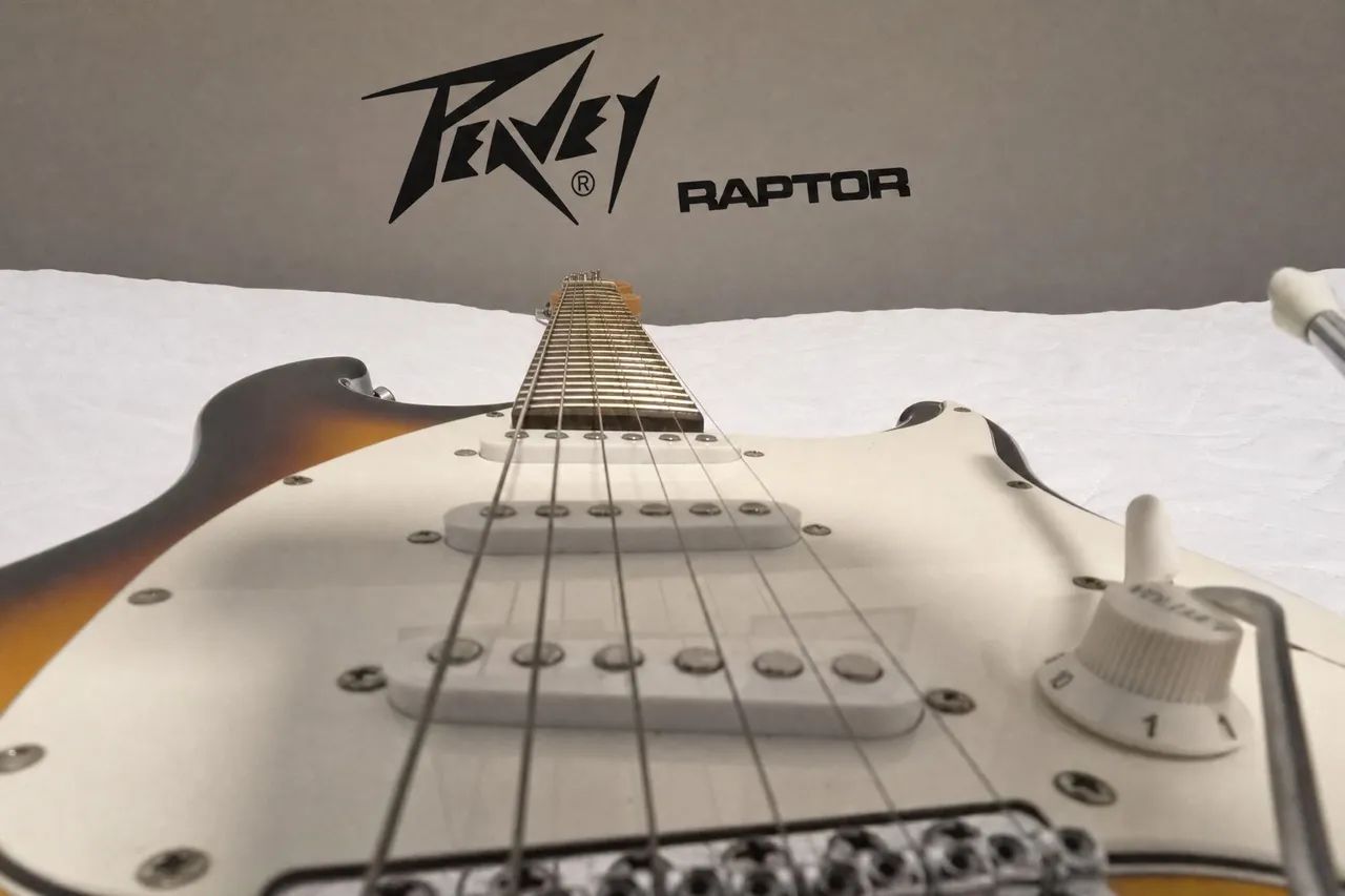Raptor plus guitarra stratocaster 