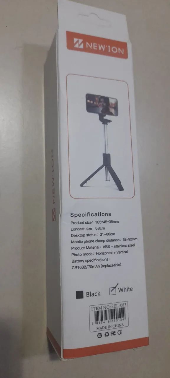 Tripé e bastão de selfie. 49,00