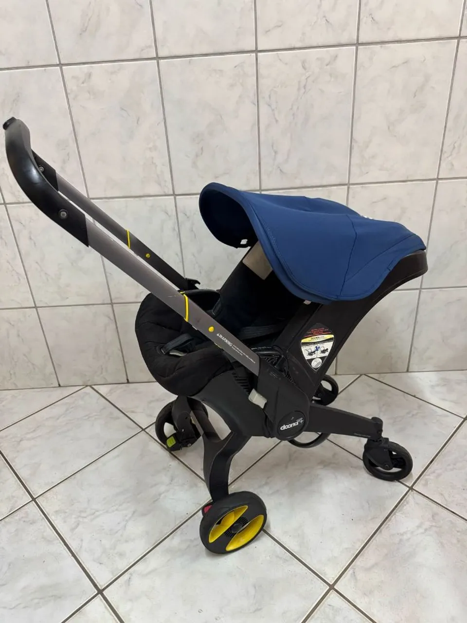 Bebê Conforto Doona