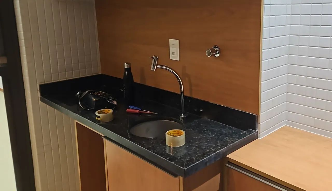 Black marble countertop, includes sink and faucet