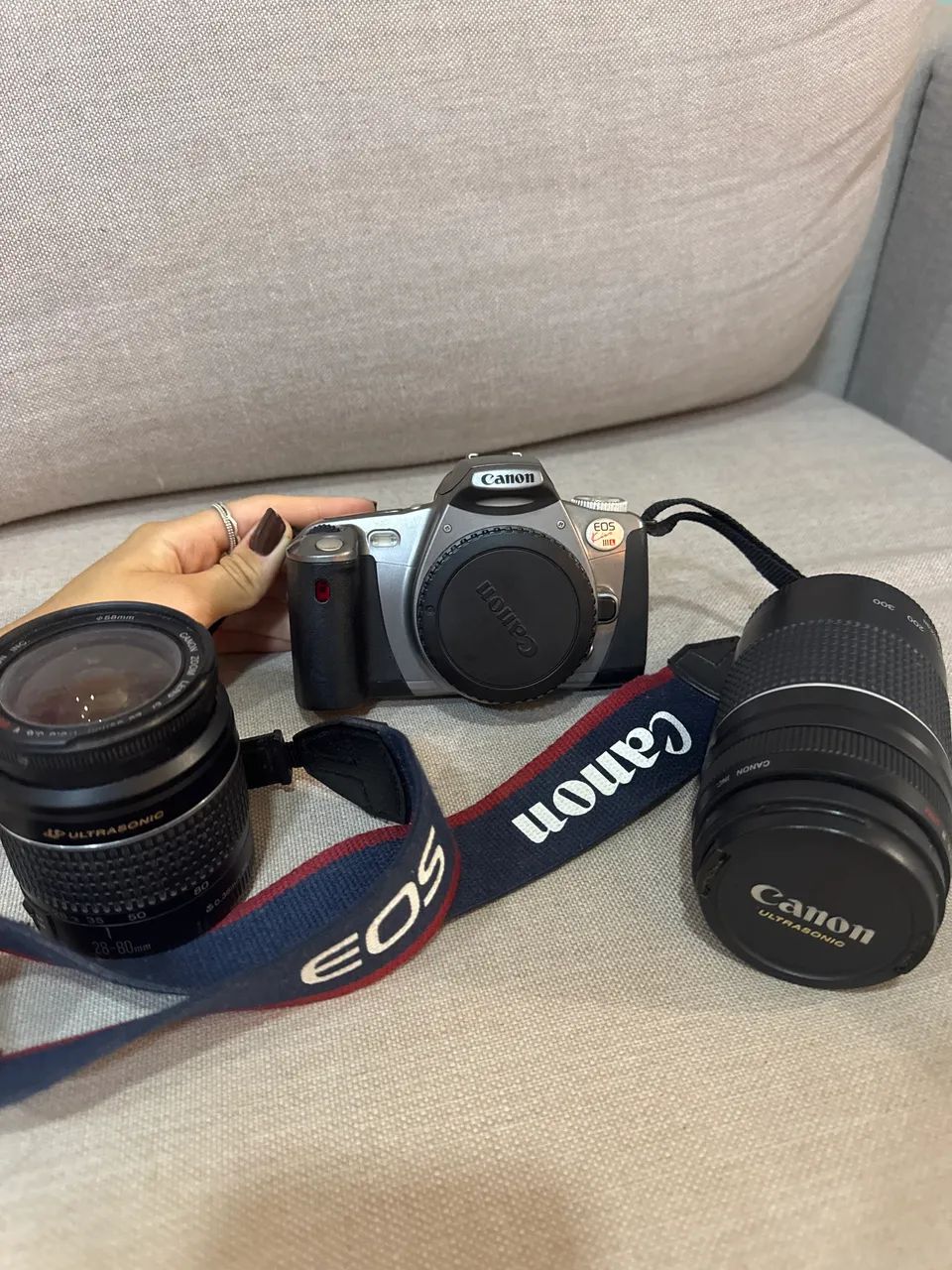 Canon EOS Kiss III L ( analógica ) + Lente Canon EF 28/80 mm + Lente Canon EF 75/300 mm