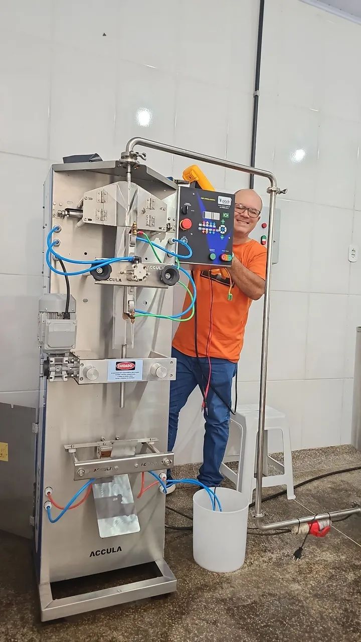 Maquina embaladora de líquidos e pastosos64304359401473122