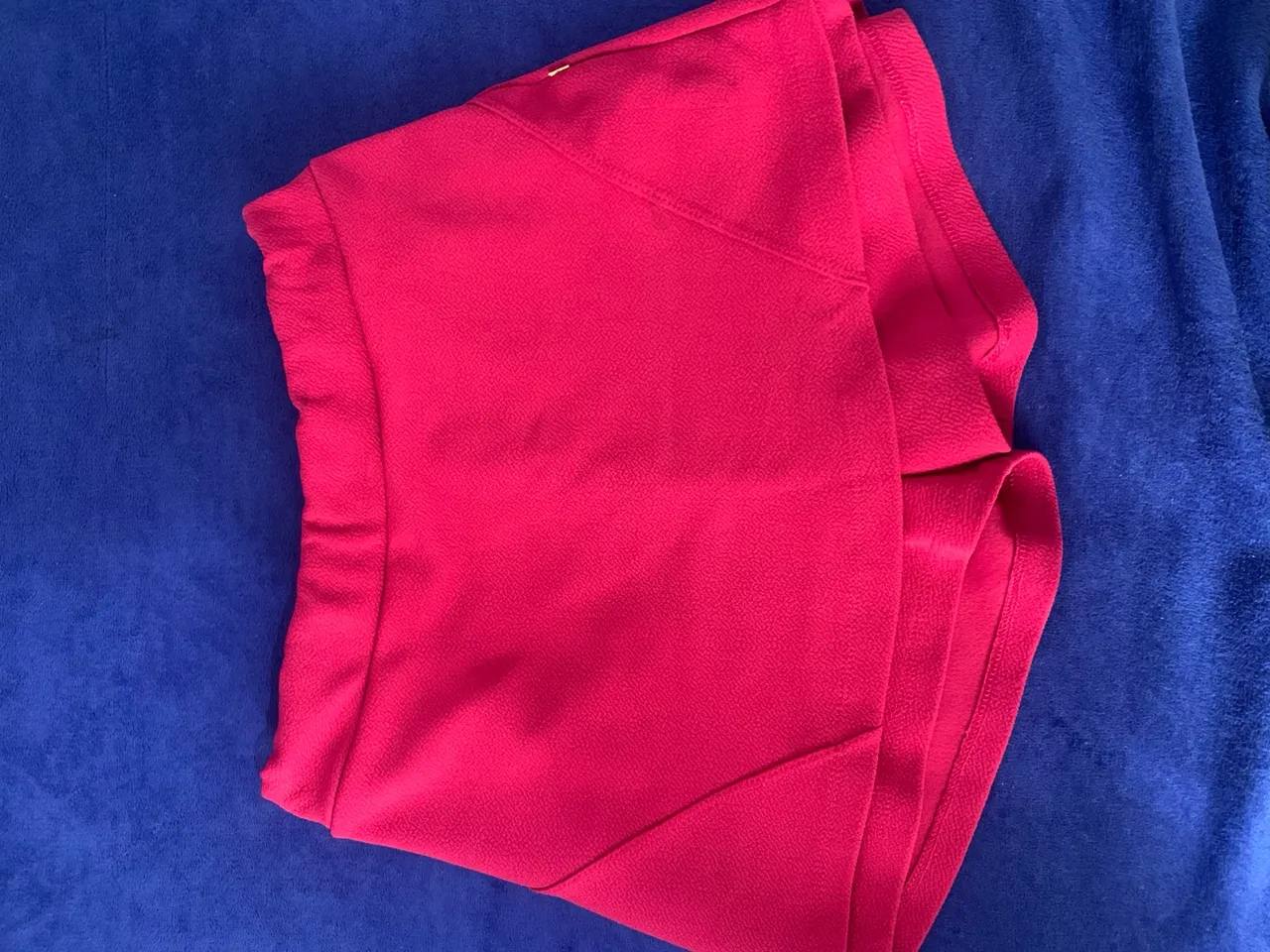 Short saia na cor rosa