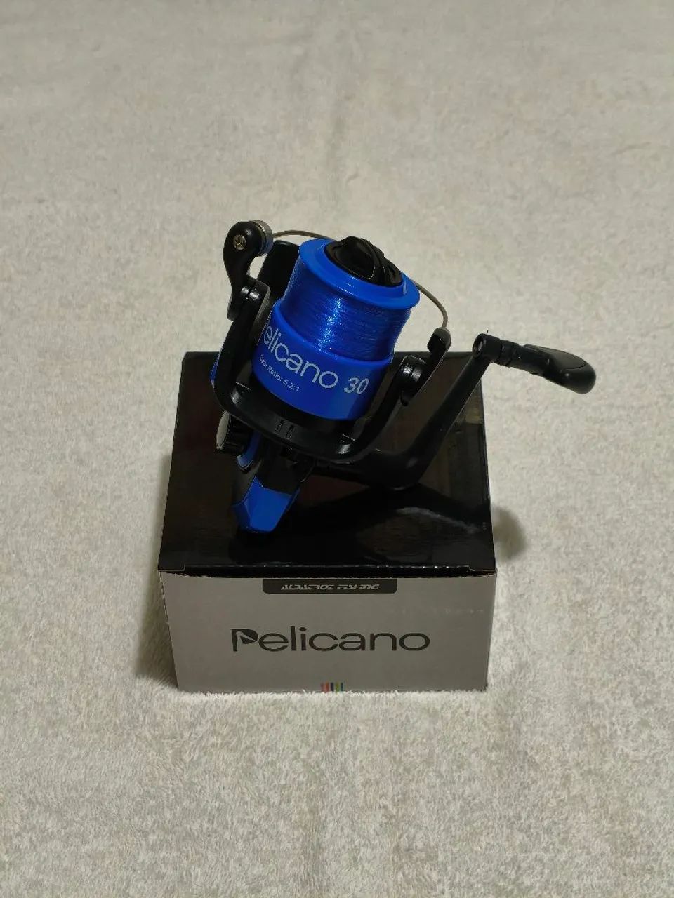 Molinete pelicano 3000 novo - Foto 3