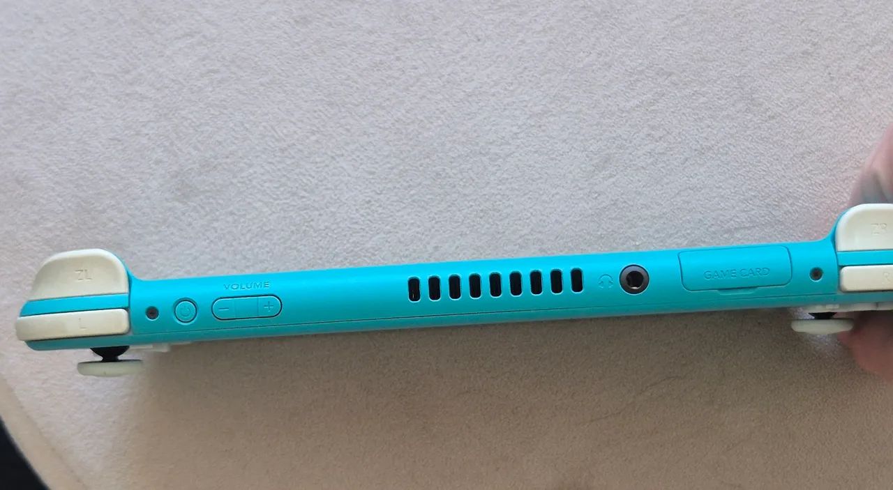 Nintendo Switch Lite, acompanha case protetora e carregador original. - Foto 3
