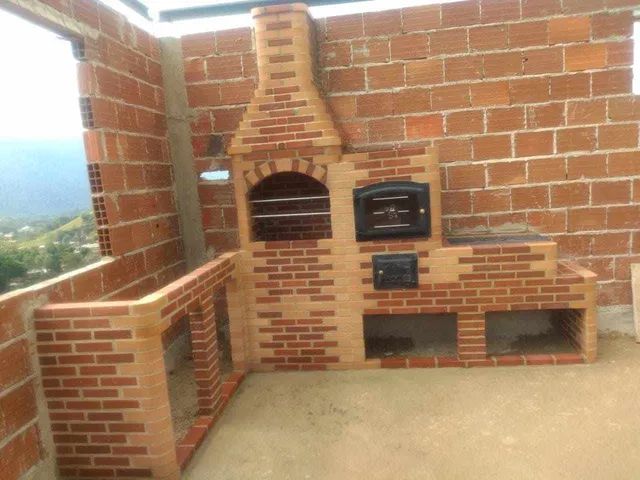 Churrasqueira , forno , fogão e bancada 