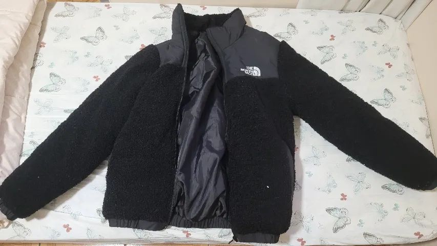 Jaqueta de frio The North Face estilo fleece Roupas Riacho das