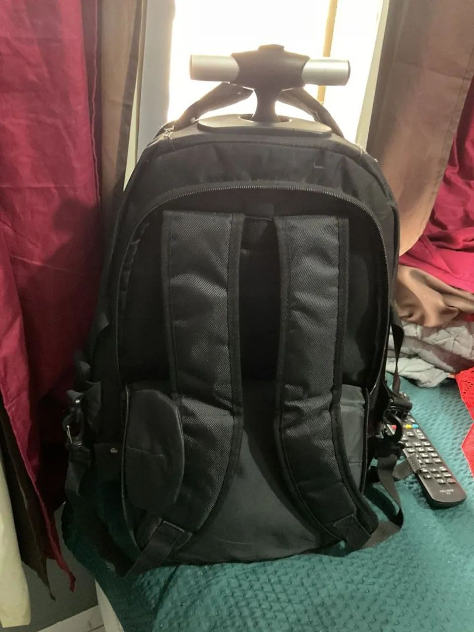 Vende-se bolsa preta de rodinha  - Foto 2
