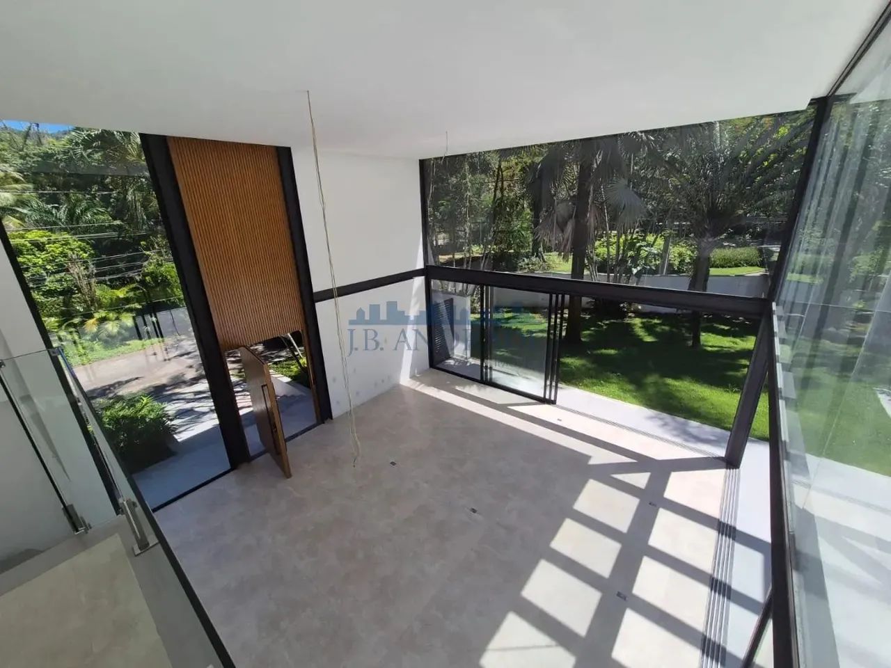Mansão com 843m² em terreno de 1001m², vista Pedra da Gávea, 5 suites no Itanhangá - Foto 5