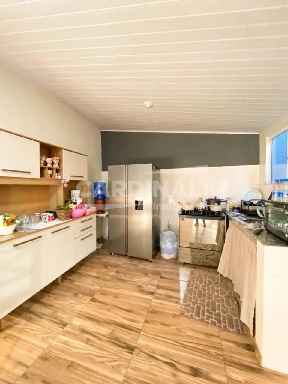 Casa com piscina e barracão, com ótima localização - Foto 5