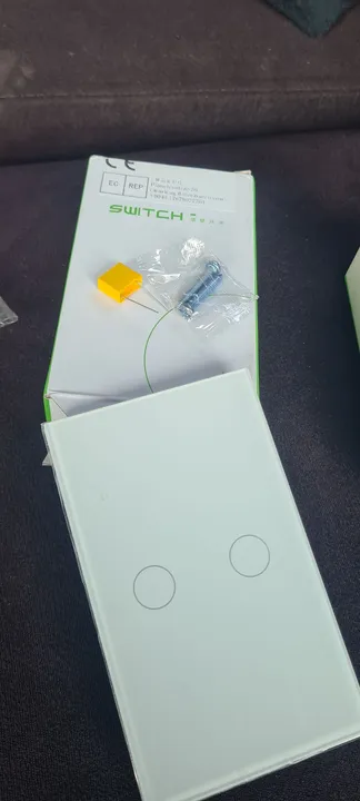Interruptor com frente de vidro branco novo 35,00 cada