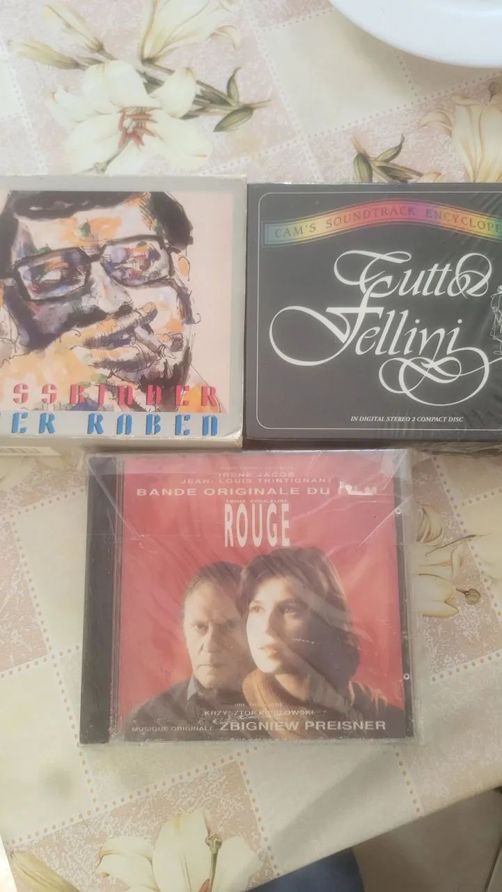 Três boxs de cds de trilhas de filmes 