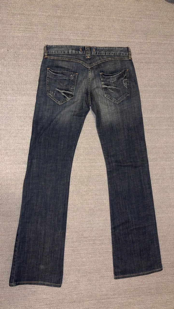 Calça jeans feminina bootcut 40 - Foto 4
