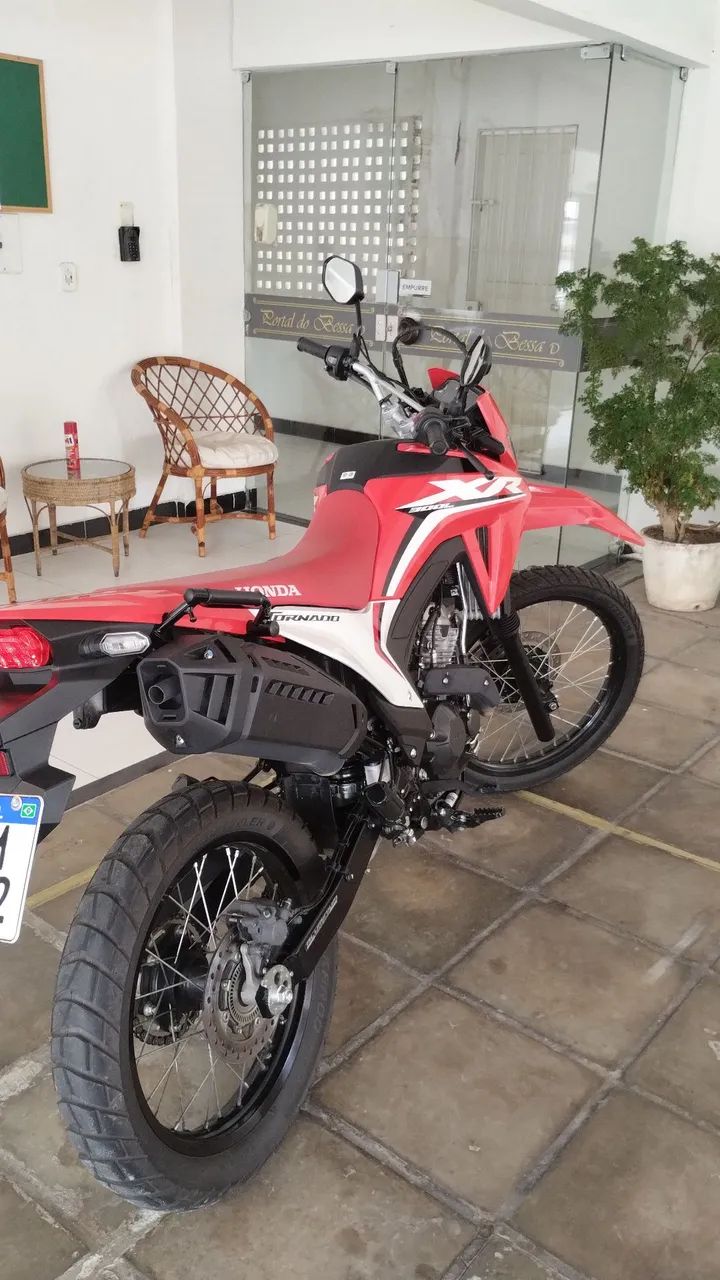 Tornado 300cc, revisada e emplacada 2026