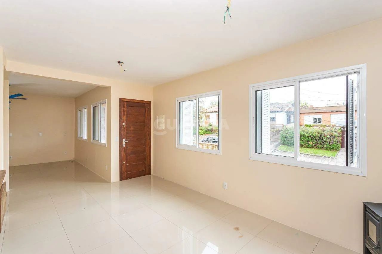 Casa residencial de 03 dormitórios, sendo 02 suítes no bairro Petrópolis. - Foto 4
